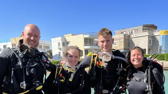 Four divers beside the sea in Hurghada – PADI Nitrox Speciality Course gallery