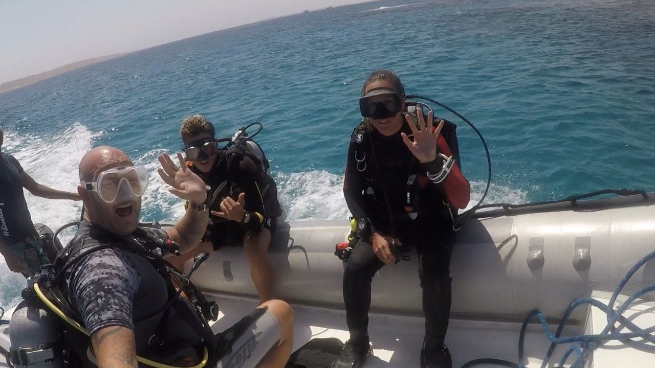 Scuba divers seated aboard a RIB in Hurghada