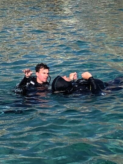 Two divers practising a surface rescue scenario on the PADI Rescue course in Hurghada