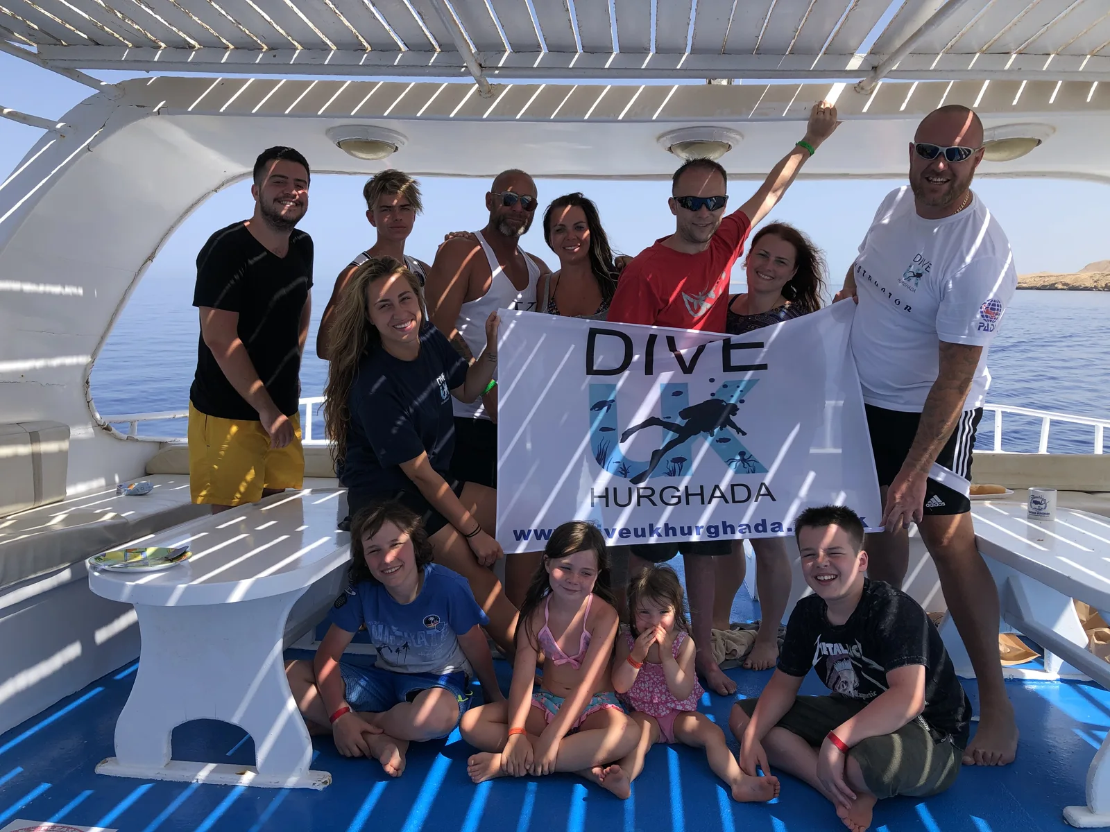 Adults and children enjoying a family diving holiday with Dive UK Hurghada